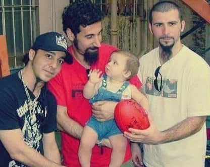 Serj Tankian and his fellow band member of System of a Down celebrating the 1st birthday of his son, Rumi. What is Tankian's height? Know his age!